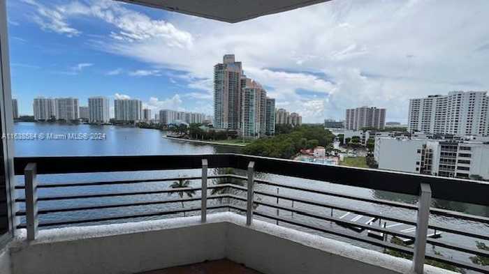 photo 1: 3530 Mystic Pointe Dr Unit 802, Aventura FL 33180