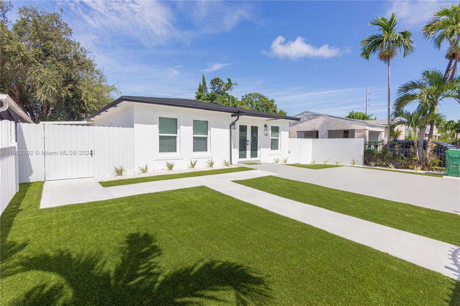 photo 1: 345 NW 45th St, Miami FL 33127