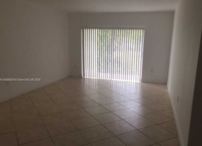 photo 1: 7670 SW 82nd St Unit 116, Miami FL 33143