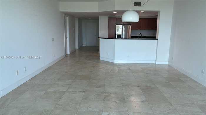 photo 1: 14951 Royal Oaks Ln Unit 702, North Miami FL 33181