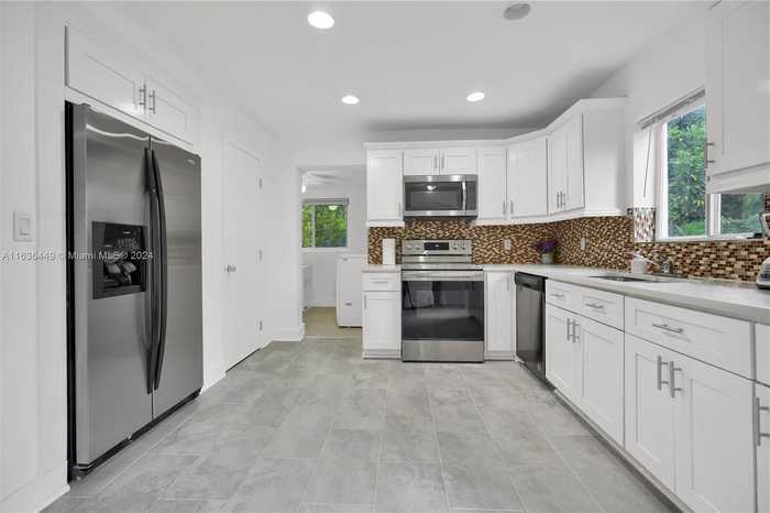 photo 2: 126 NW 33rd St, Miami FL 33127