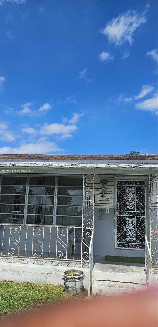 photo 2: 1061 NW 87th St, Miami FL 33150