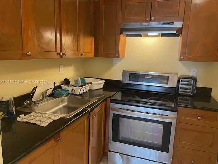 photo 1: 4251 NW 5th St Unit 112, Plantation FL 33317