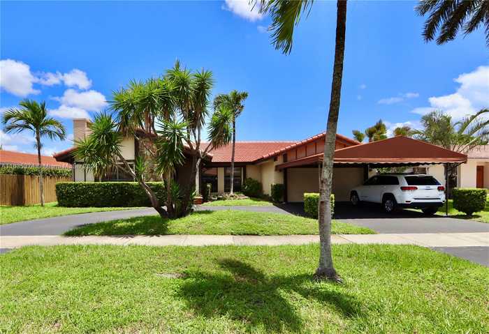 photo 1: 2011 NE 207th St, Miami FL 33179