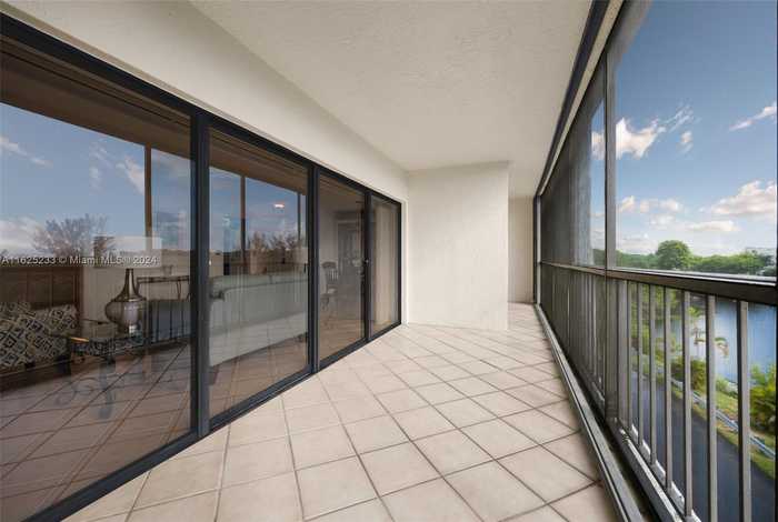 photo 2: 14203 SW 66th St Unit 308, Miami FL 33183