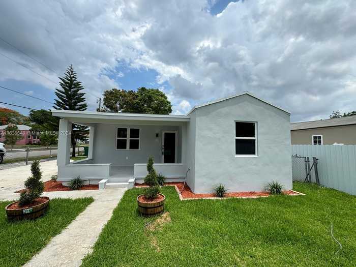 photo 1: 5573 NW 24th Ave, Miami FL 33142