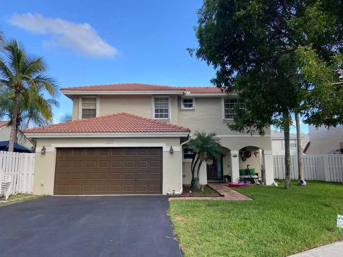 photo 1: 12626 NW 11th Pl, Sunrise FL 33323