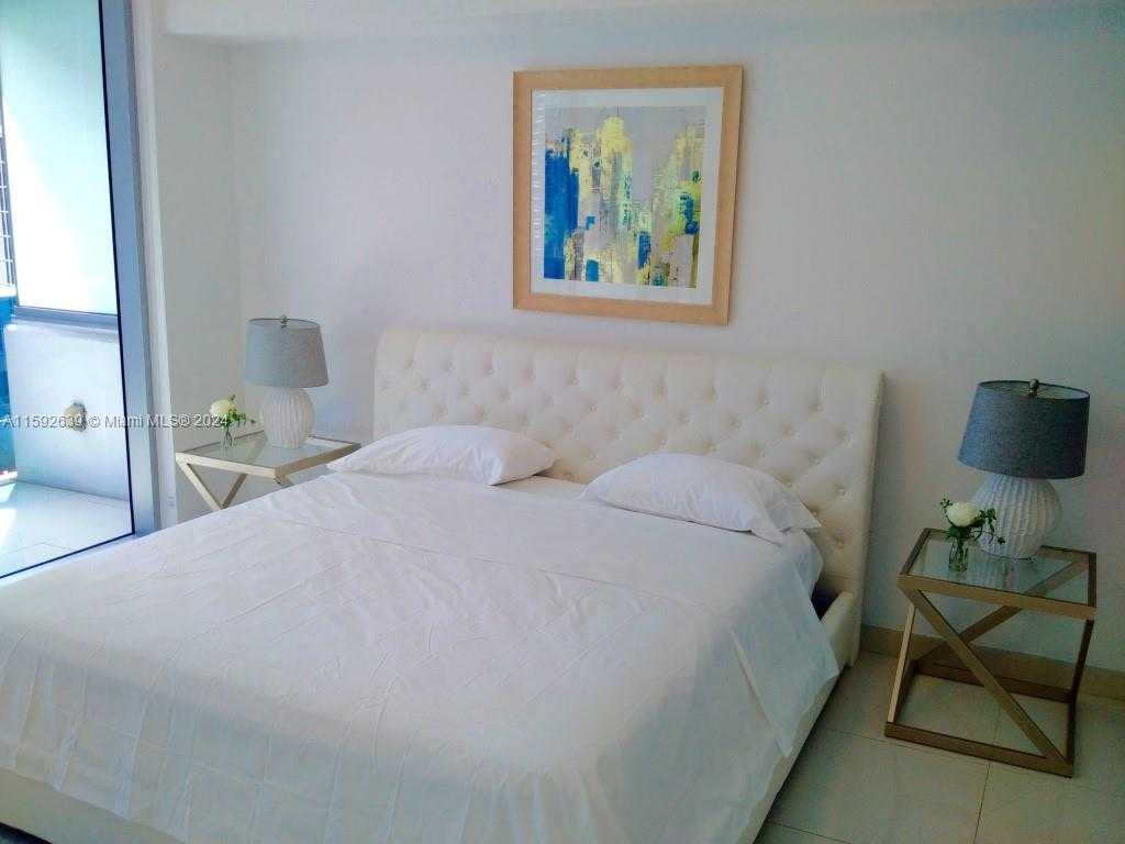 photo 2: 200 Biscayne Boulevard Way Unit 906, Miami FL 33131