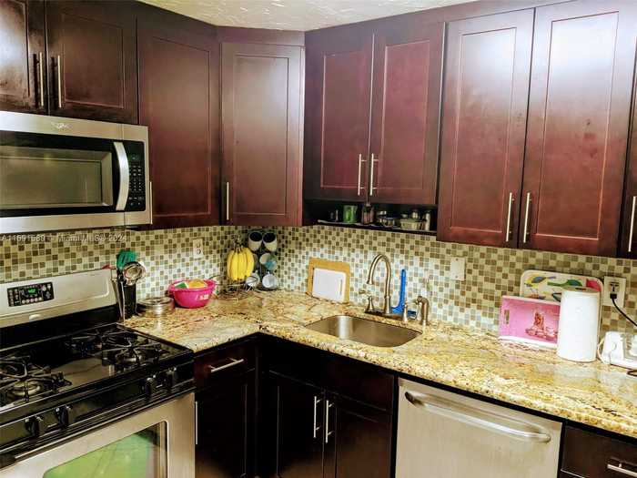 photo 1: 8650 SW 67th Ave Unit 1023, Pinecrest FL 33156