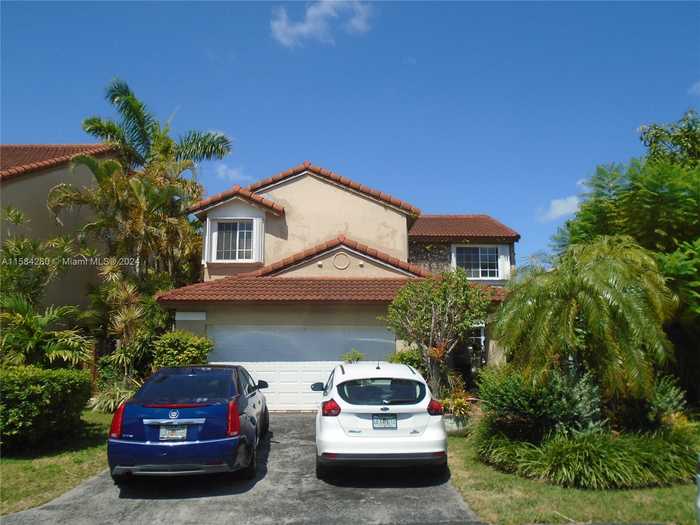 photo 1: 11251 SW 151st Ct, Miami FL 33196