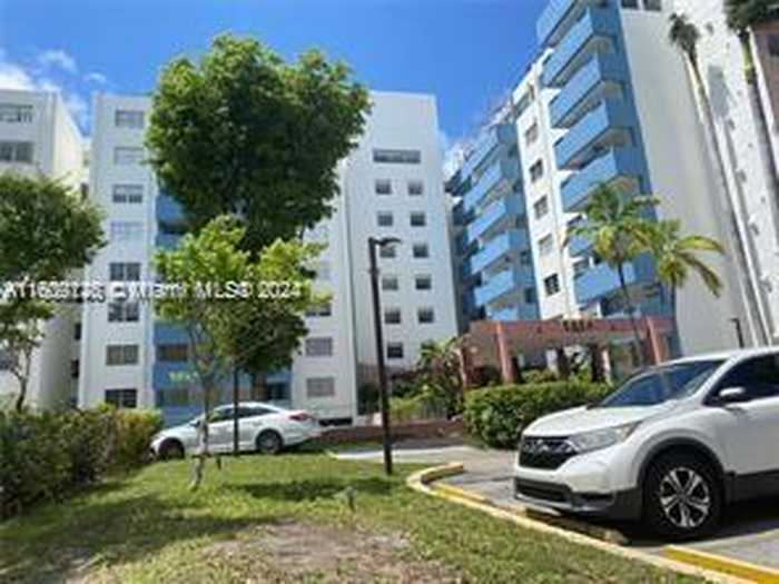 photo 1: 5050 NW 7th St Unit 403, Miami FL 33126