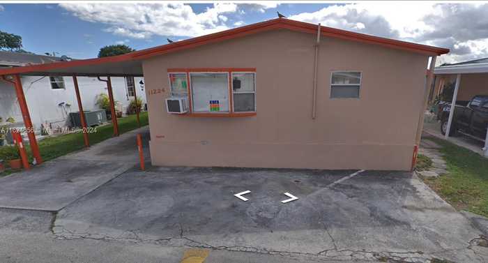 photo 1: 11224 NW 6th ST, Miami FL 33172