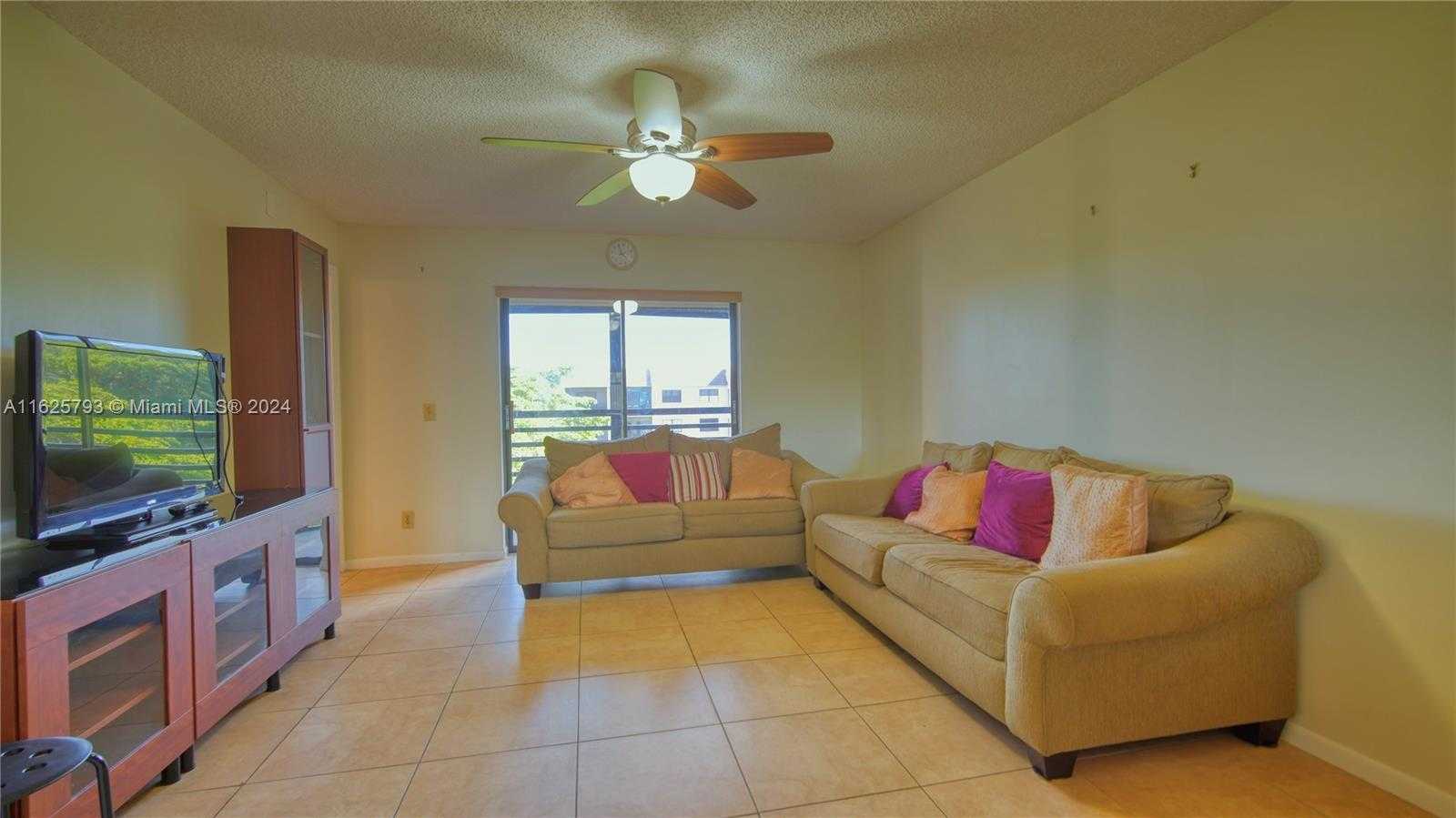 photo 1: 10332 Sunrise Lakes Blvd Unit 303, Sunrise FL 33322