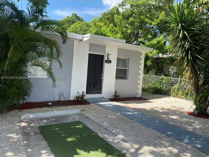 photo 1: 1860 NW 59th St, Miami FL 33142