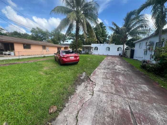 photo 1: 3040 NW 30th St, Miami FL 33142