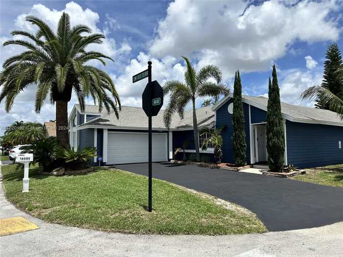 photo 1: 14085 SW 103rd Ter, Miami FL 33186