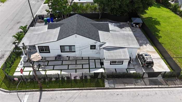 photo 1: 1772 NW 3rd St, Miami FL 33125