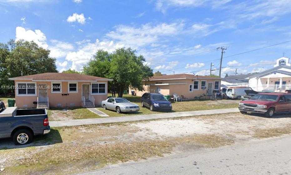 photo 2: 2400 NW 61st St, Miami FL 33142