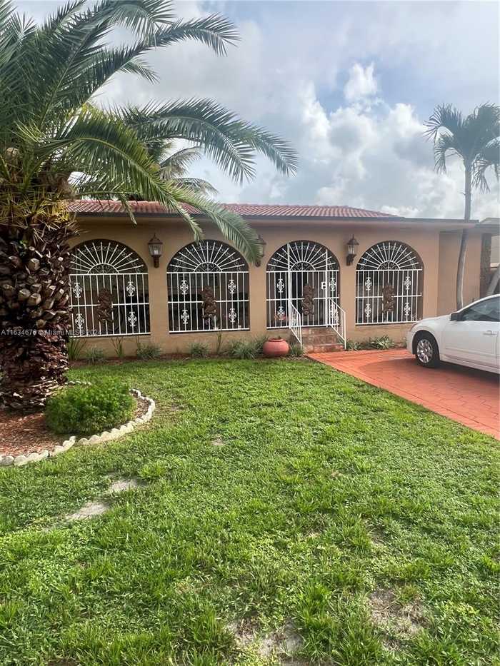 photo 1: 180 E 62nd St, Hialeah FL 33013