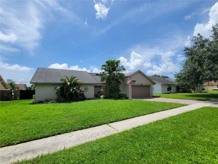 photo 1: 8300 NW 51st Ct, Lauderhill FL 33351