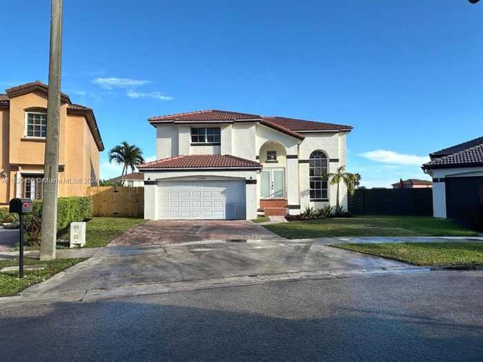 photo 1: 13206 NW 10th Ln, Miami FL 33182