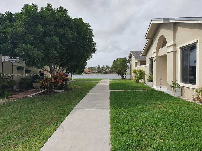 photo 1: 6702 SW 152nd Pl Unit 28-02, Miami FL 33193