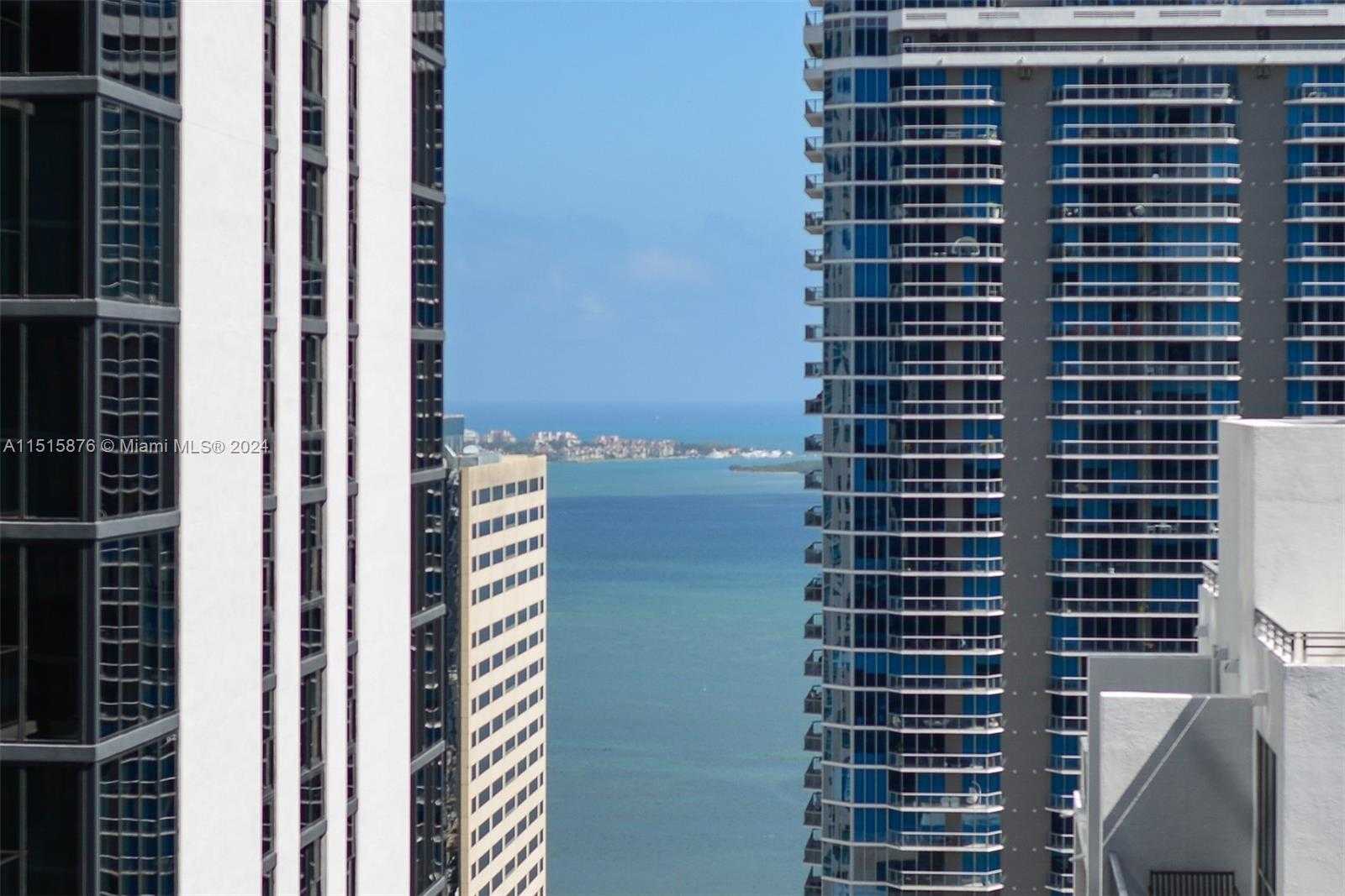 photo 1: 1000 Brickell Plz Unit 3703, Miami FL 33131