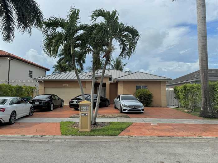 photo 1: 14963 SW 32nd Ter, Miami FL 33185