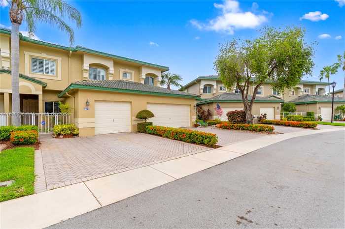 photo 1: 7910 E Exeter Blvd E Unit 103, Tamarac FL 33321