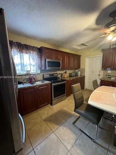 photo 3: 2235 NW 35th St, Miami FL 33142