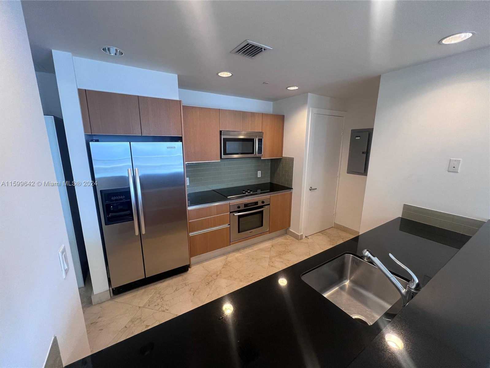 photo 2: 1050 Brickell Ave Unit 2702, Miami FL 33131