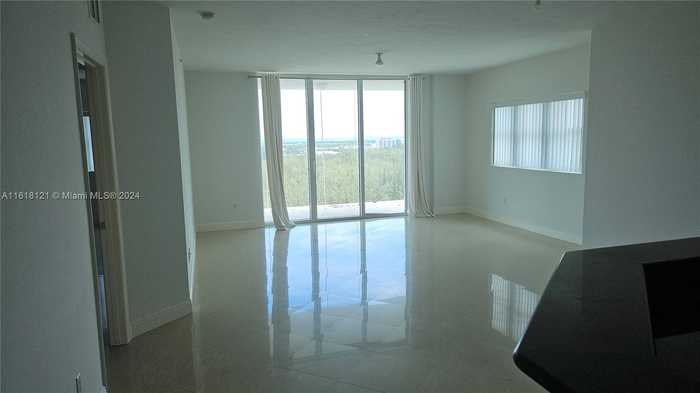 photo 1: 15051 Royal Oaks Ln Unit 1706, North Miami FL 33181