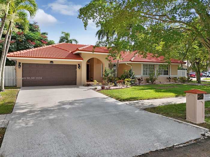 photo 1: 15233 SW 112 terrace, Miami FL 33196