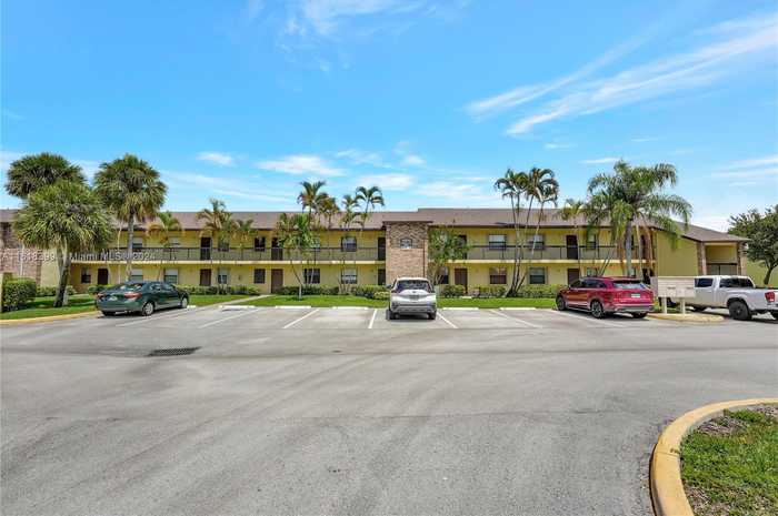 photo 1: 10013 Winding Lake Rd Unit 207, Sunrise FL 33351