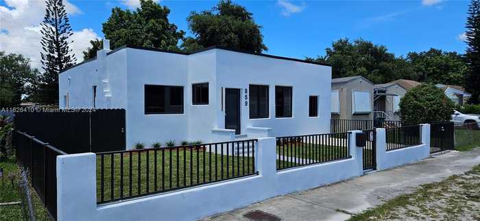 photo 1: 859 NW 77th St, Miami FL 33150