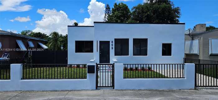 photo 2: 859 NW 77th St, Miami FL 33150