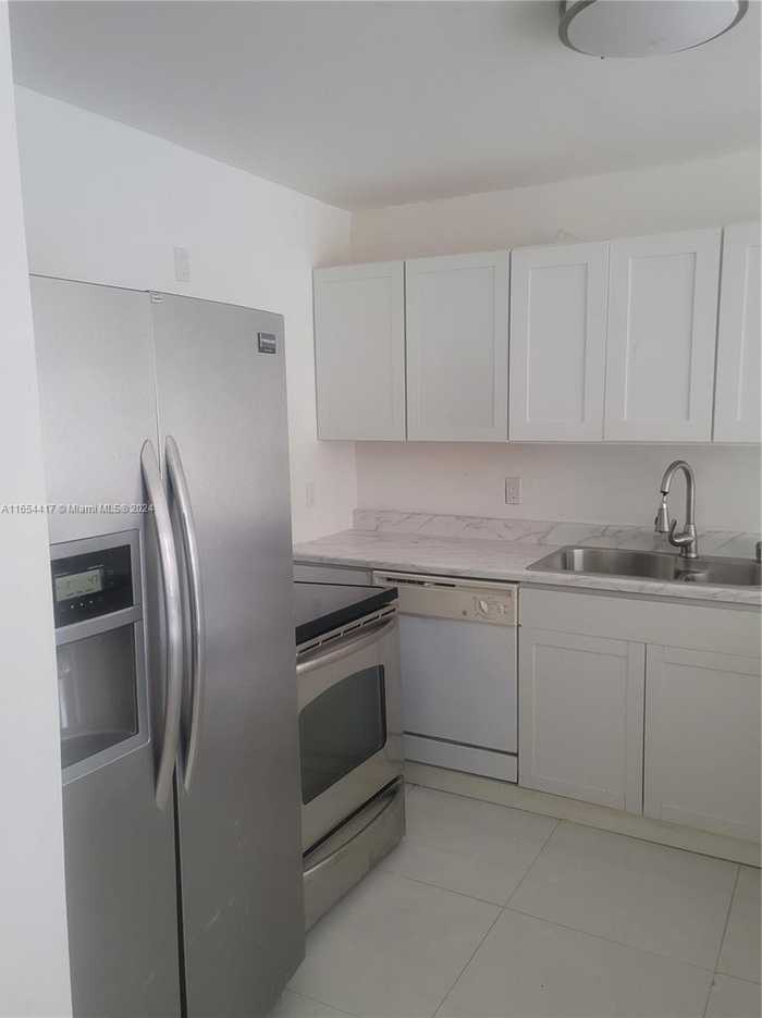 photo 1: 15221 NE 6th Ave Unit A307, Miami FL 33162