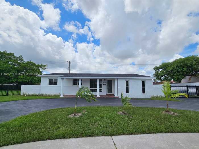 photo 1: 9230 SW 19th St, Miami FL 33165