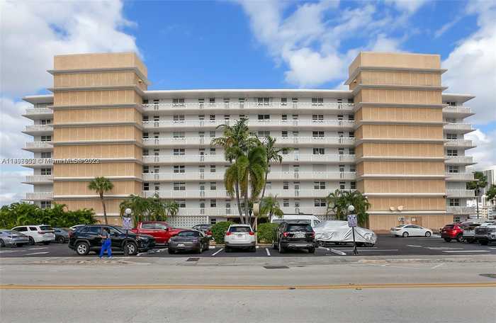 photo 1: 410 Golden Isles Dr Unit 202, Hallandale Beach FL 33009