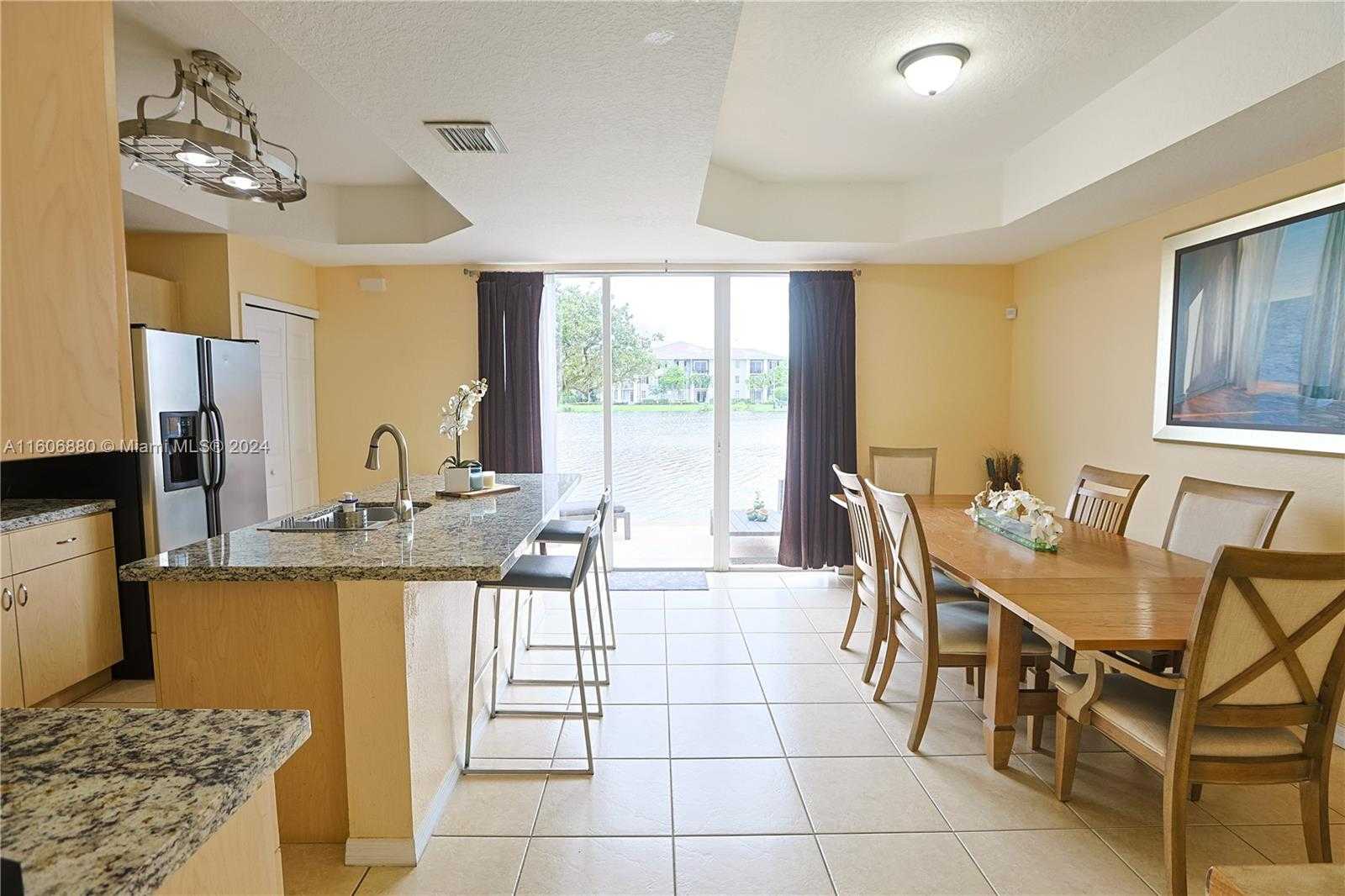 photo 2: 10609 SW 6th St Unit 1005, Pembroke Pines FL 33025