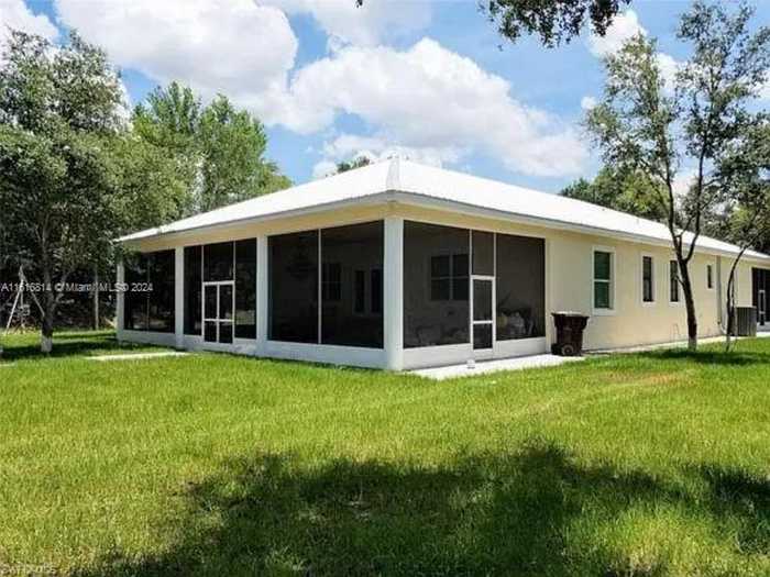 photo 1: 255 C Rd, La Belle FL 33935