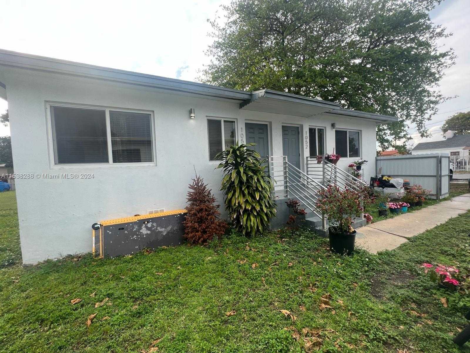 photo 2: 1050 NW 35th St, Miami FL 33127