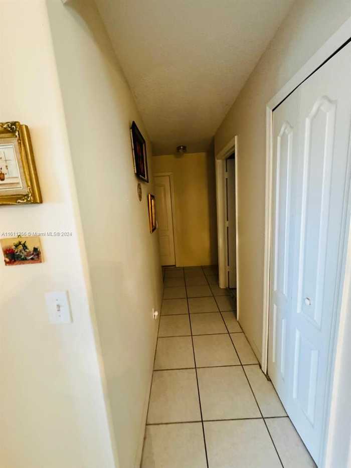 photo 2: 1141 NW 127th Ct, Miami FL 33182