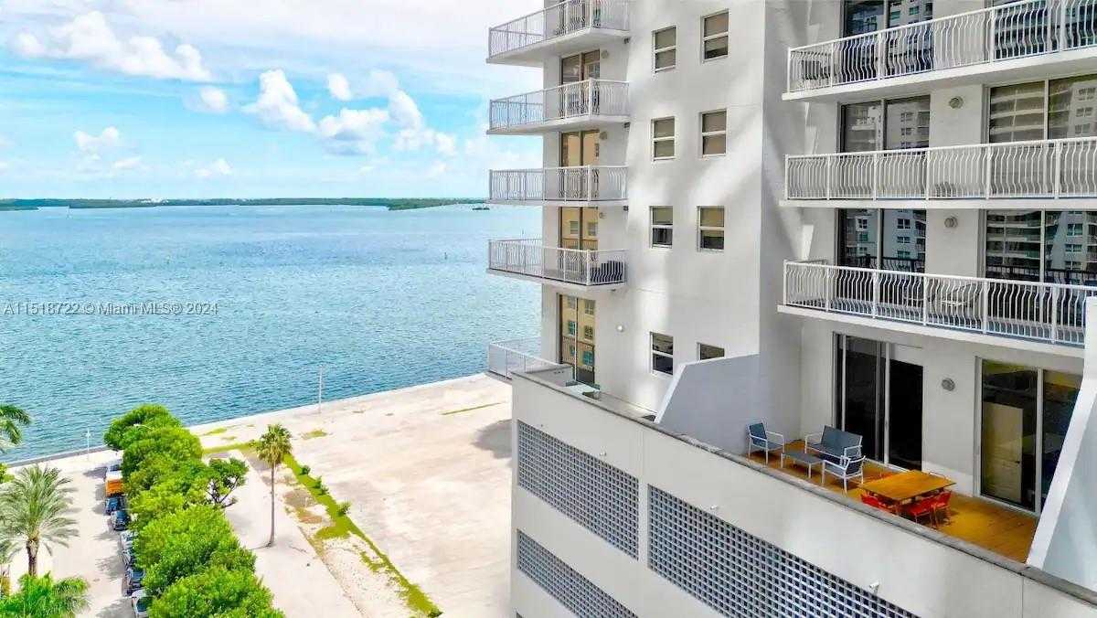 photo 1: 1200 Brickell Bay Dr Unit 1404, Miami FL 33131