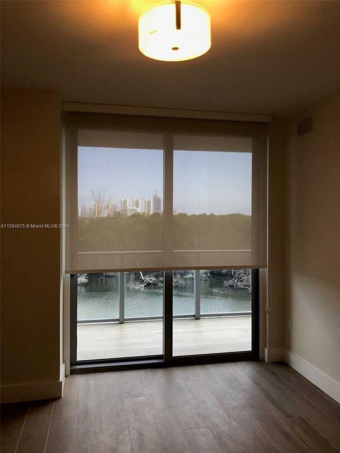 photo 1: 16385 Biscayne Blvd Unit 519, North Miami Beach FL 33160