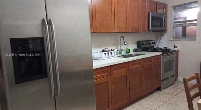 photo 2: 1285 NW 29th Ter, Miami FL 33142