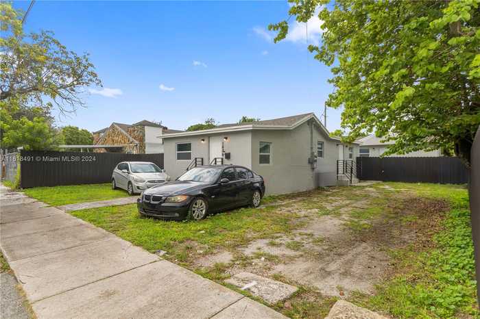 photo 1: 1484 NW 58th Ter, Miami FL 33142