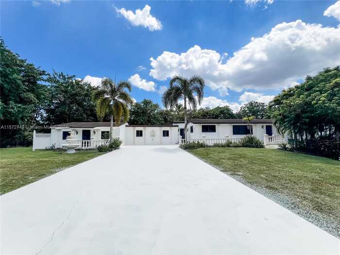 photo 1: 12200 NW 20th Ct, Plantation FL 33323