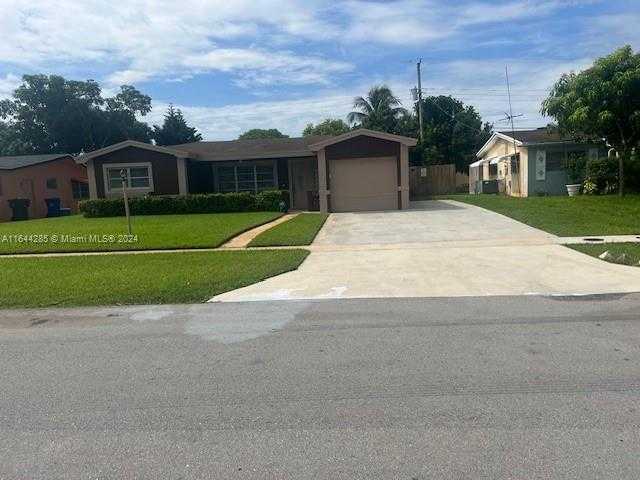 photo 1: 3332 NW 34th Street, Lauderdale Lakes FL 33309