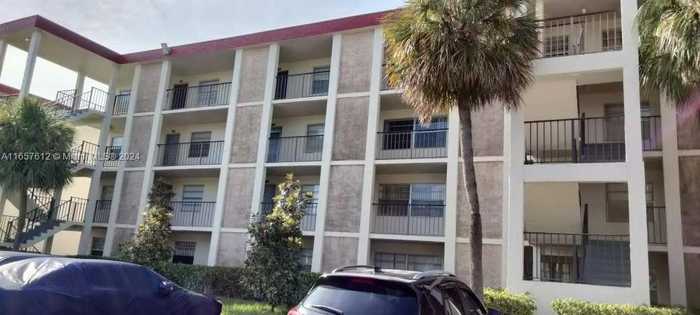 photo 1: 3001 NW 48th Ave Unit 333, Lauderdale Lakes FL 33313